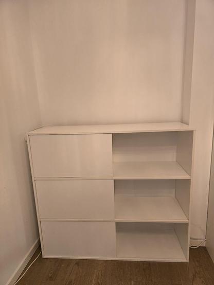 White Side board with the doors all to the left.