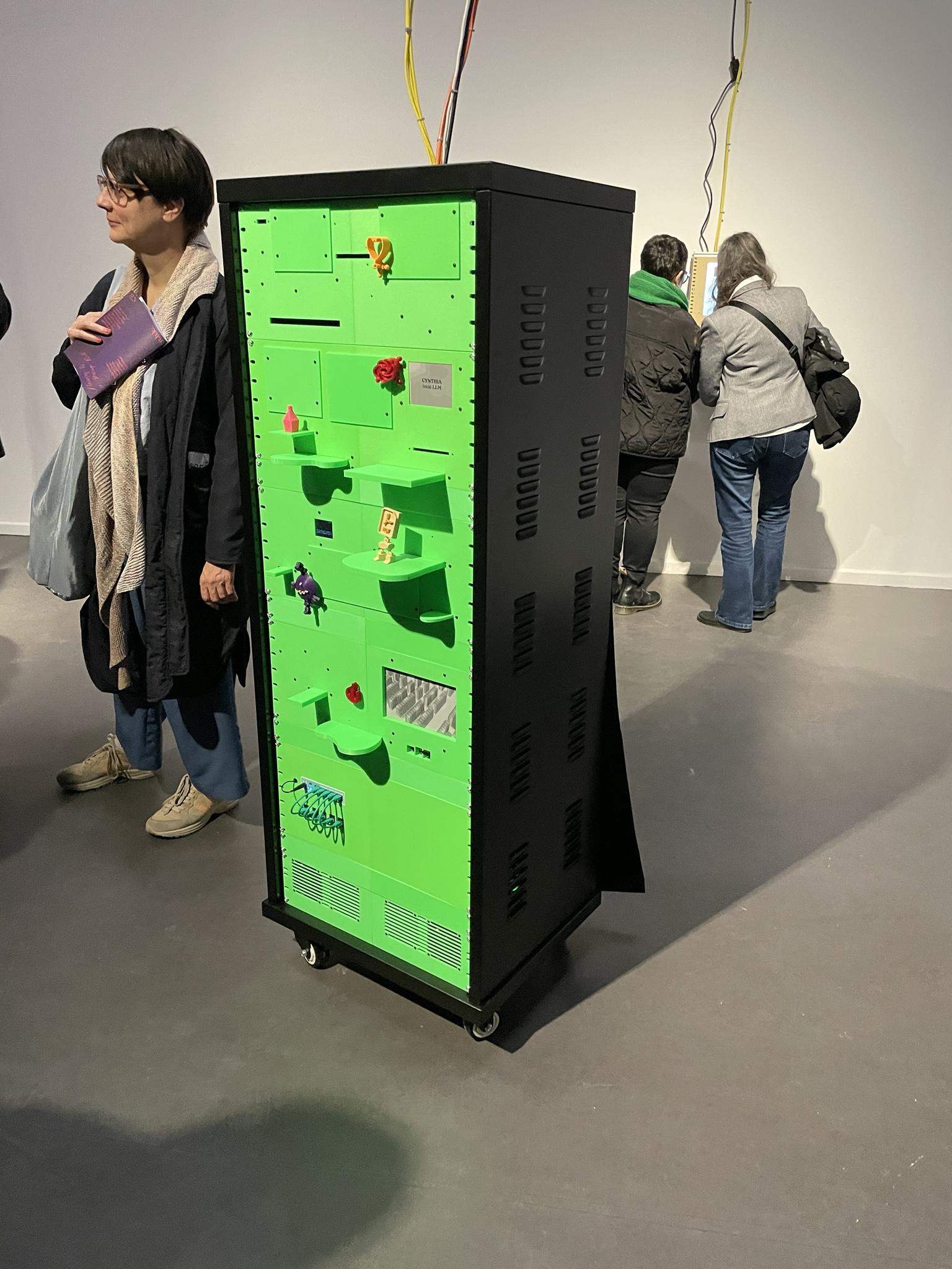 Green server rack with 3d printed objects